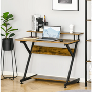 مكتب كمبيوتر خشبي بإطار معدني على شكل Z في غرفة عصرية
Wooden computer desk with Z-shaped metal frame in modern room